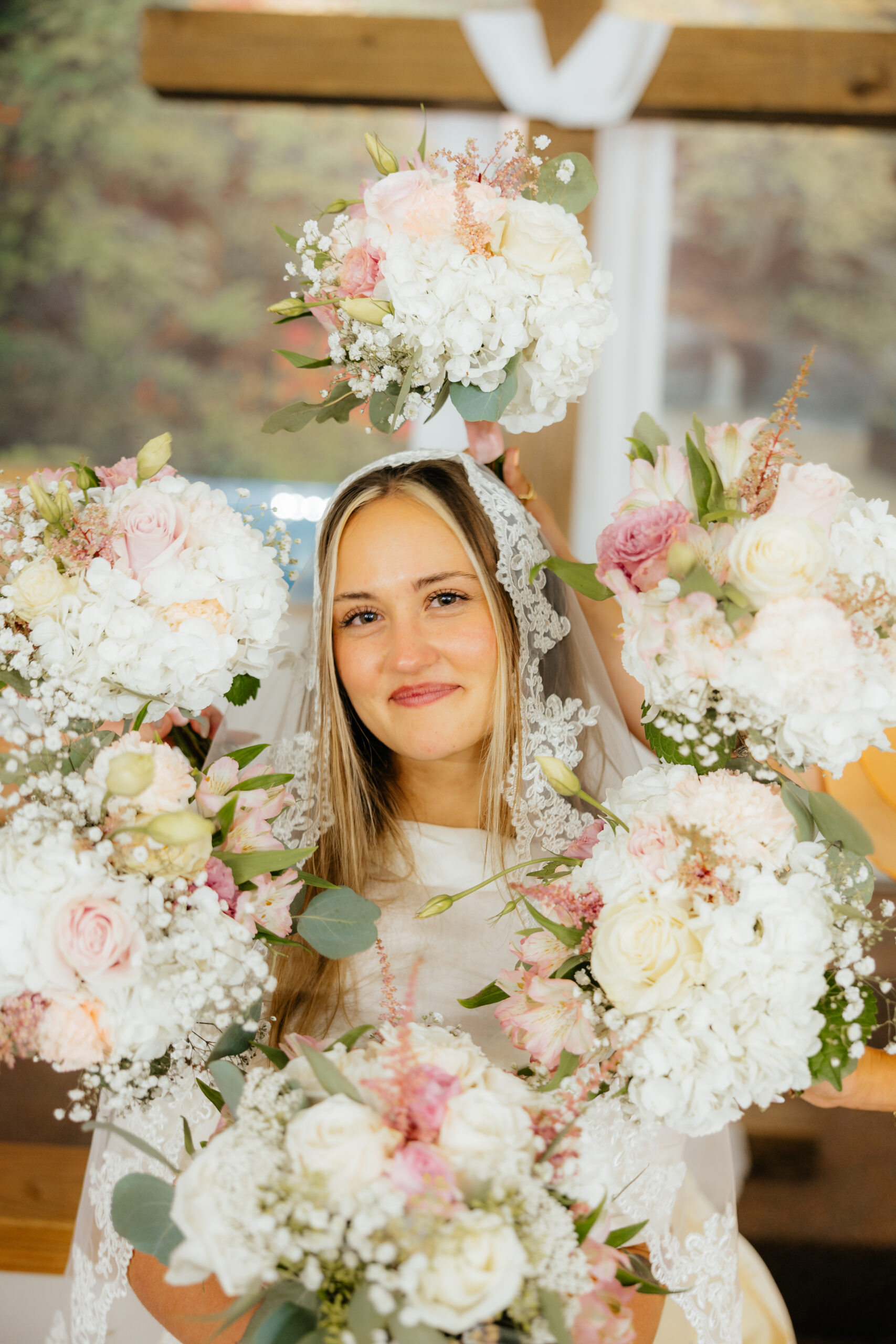 A bride with a flower crown around her face.