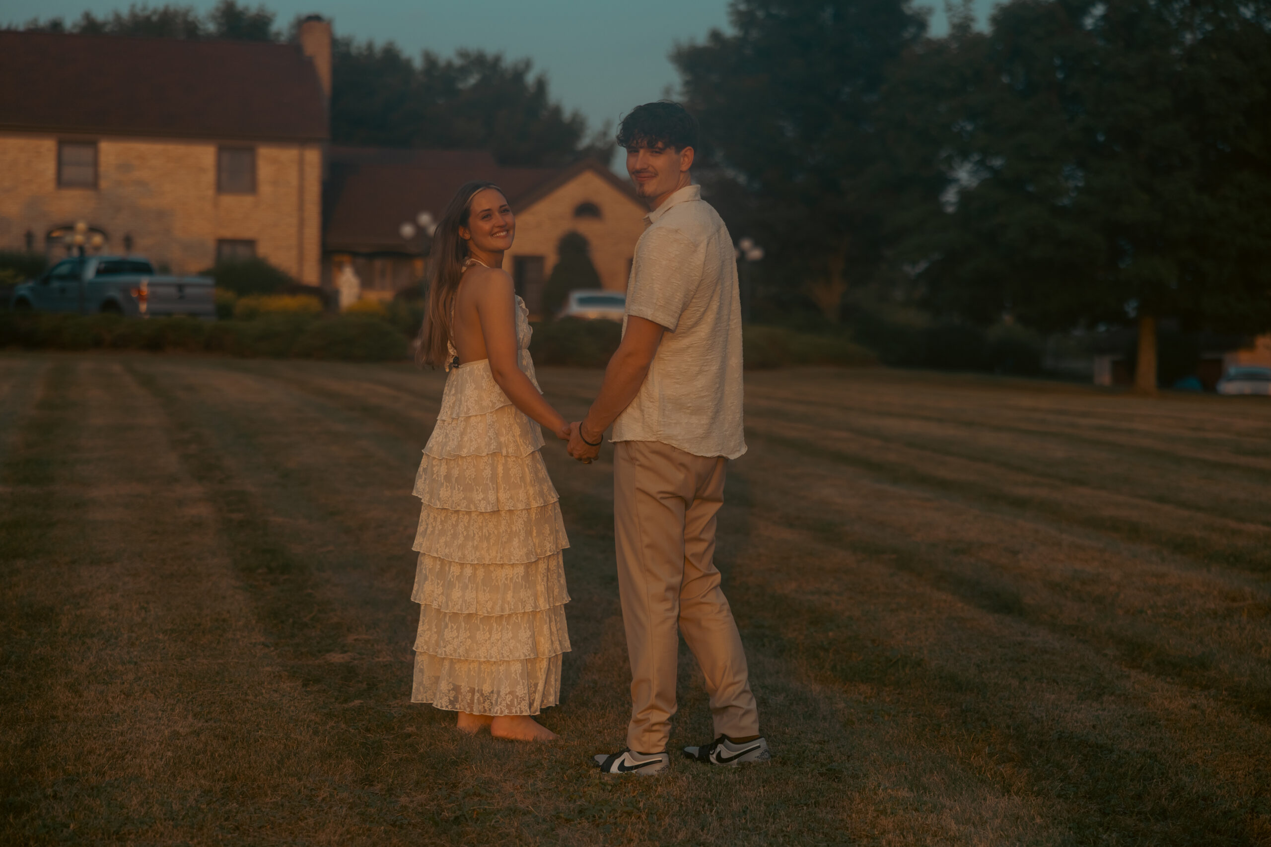 A bride and groom at sunset.